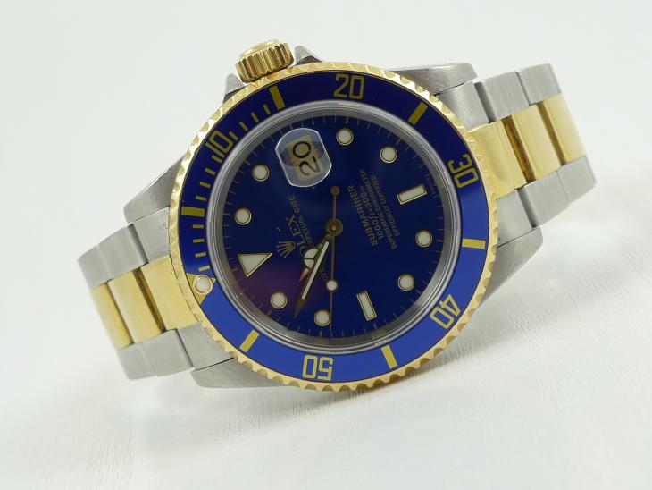Rolex Submariner G/S med DK papir