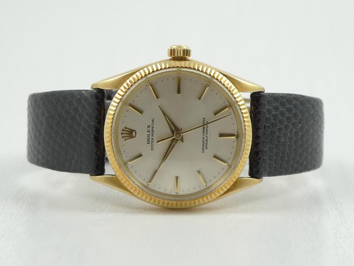 Rolex Oyster 14K masiv guld
