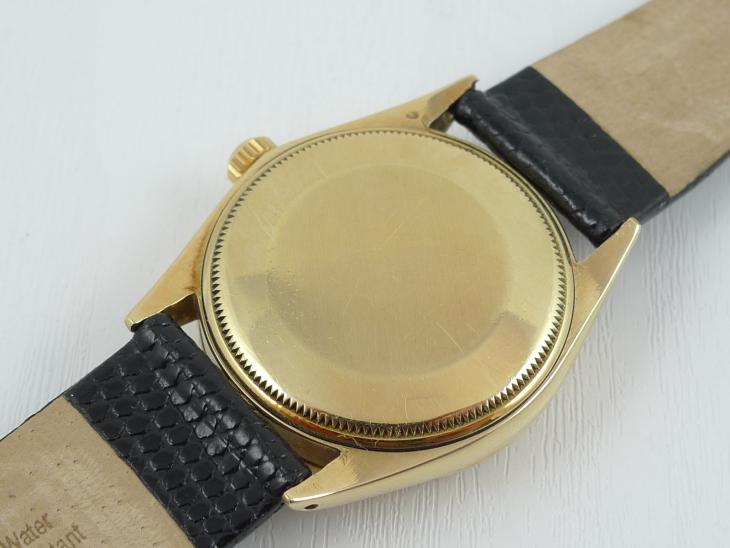 Rolex Oyster 14K masiv guld
