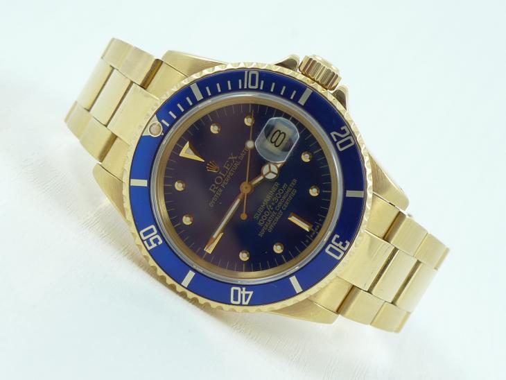 Rolex Submariner G/G med B&P