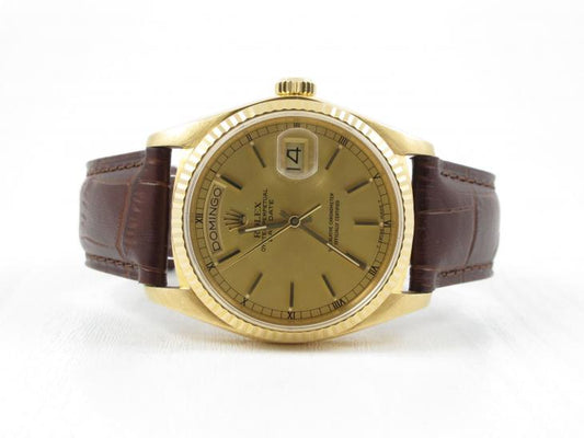 Rolex Daydate 18K på rem
